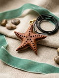Tide & Timber: Hand-Carved Starfish Pendant